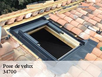 Pose de velux  34700